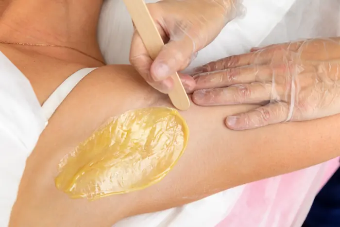 Picture of waxing an armpit
