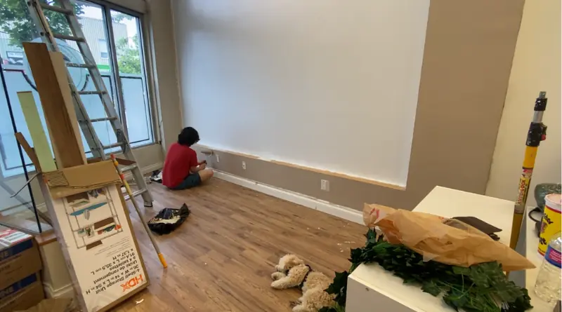 picture of coco and his owner decorating the wall